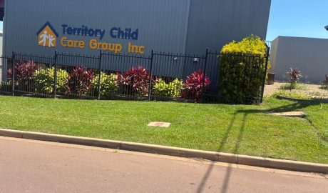 Commercial property maintenance at TCCG HQ in Darwin with landscaped edging and grounds upkeep by iScape NT.